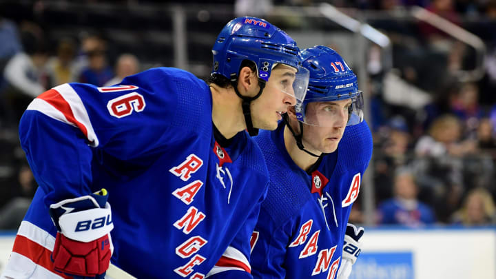 NEW YORK, NEW YORK – OCTOBER 12: Brady Skjei #76 and Jesper Fast #17 of the New York Rangers talk during the third period against the Edmonton Oilers at Madison Square Garden on October 12, 2019 in New York City. (Photo by Emilee Chinn/Getty Images)