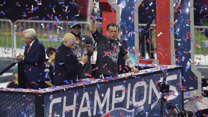 HOUSTON, TX - FEBRUARY 05: Tom Brady #12 of the New England Patriots raises the Vince Lombardi trophy after the Patriots defeat the Atlanta Falcons 34-28 in overtime of Super Bowl 51 at NRG Stadium on February 5, 2017 in Houston, Texas. (Photo by Focus on Sport/Getty Images)