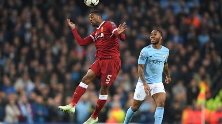 MANCHESTER, ENGLAND - APRIL 10: Georginio Wijnaldum of Liverpool wins a header during the UEFA Champions League Quarter Final Second Leg match between Manchester City and Liverpool at Etihad Stadium on April 10, 2018 in Manchester, England. (Photo by Shaun Botterill/Getty Images,)
