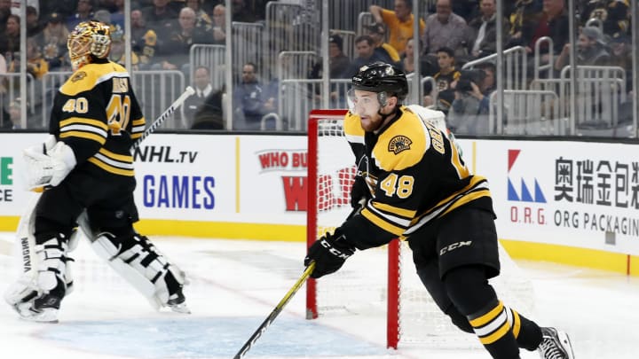 BOSTON, MA - OCTOBER 22: Boston Bruins left defenseman Matt Grzelcyk (48) starts up ice during a game between the Boston Bruins and the Toronto Maple Leafs on October 22, 2019, at TD Garden in Boston, Massachusetts. (Photo by Fred Kfoury III/Icon Sportswire via Getty Images)