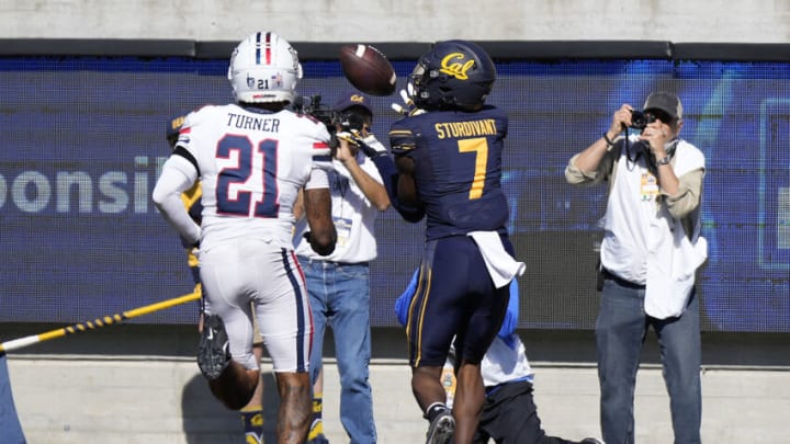 BERKELEY, CALIFORNIA - SEPTEMBER 24: Wide receiver J. Michael Sturdivant #7 of the California Golden Bears catches a 16 yard touchdown pass over safety Jaxen Turner #21 of the Arizona Wildcats in the first half at FTX Field at California Memorial Stadium on September 24, 2022 in Berkeley, California. (Photo by Thearon W. Henderson/Getty Images)