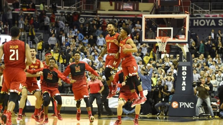 Nov 15, 2016; Washington, DC, USA; Maryland Terrapins guard Jaylen Brantley (1) and Maryland Terrapins guard Anthony Cowan (0) celebrates with their teammates on the court after defeating Georgetown Hoyas 76-75 at Verizon Center. Mandatory Credit: Tommy Gilligan-USA TODAY Sports