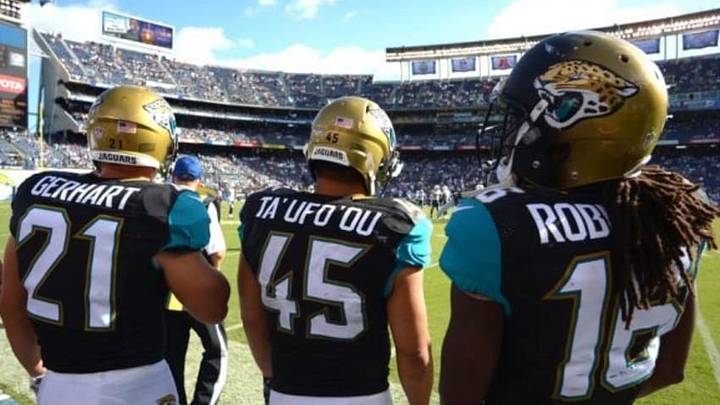 Sep 28, 2014; San Diego, CA, USA; Jacksonville Jaguars running back Toby Gerhart (21) and fullback Will Ta'ufo'ou (45) and wide receiver Denard Robinson (16) on the sideline during the fourth quarter against the San Diego Chargers at Qualcomm Stadium. Mandatory Credit: Jake Roth-USA TODAY Sports