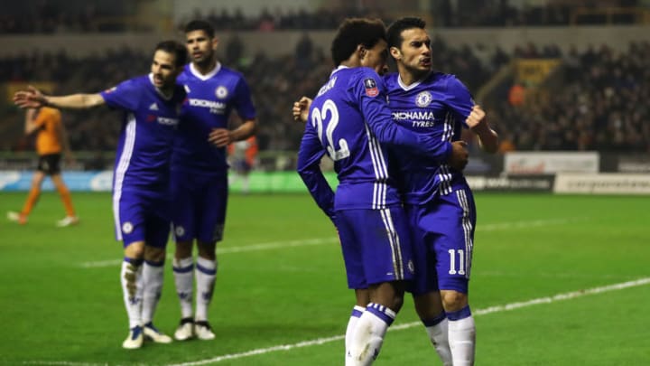 WOLVERHAMPTON, ENGLAND - FEBRUARY 18: Pedro of Chelsea celebrates scoring the opening goal with team-mate Willian during the Emirates FA Cup Fifth Round match between Wolverhampton Wanderers and Chelsea at Molineux on February 18, 2017 in Wolverhampton, England. (Photo by Chris Brunskill Ltd/Getty Images)