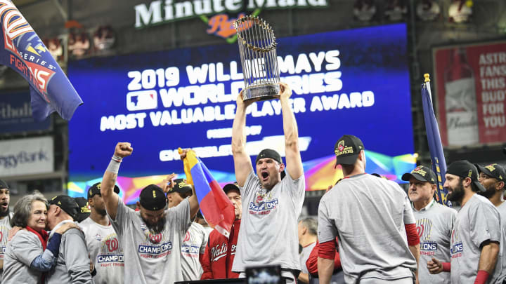 HOUSTON, TEXAS – OCTOBER 30: The Washington Nationals, including Washington Nationals first baseman Ryan Zimmerman (11) holding trophy, celebrate beating the Houston Astros 6-2 in Game 7 of the World Series at Minute Maid Park on Wednesday, October 30, 2019.(Photo by Jonathan Newton/The Washington Post via Getty Images)