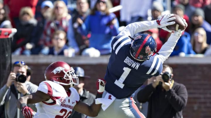 OXFORD, MS - OCTOBER 28: A.J. Brown #1 of the Ole Miss Rebels catches a pass over Josh Liddell #28 of the Arkansas Razorbacks at Hemingway Stadium on October 28, 2017 in Oxford, Mississippi. (Photo by Wesley Hitt/Getty Images)