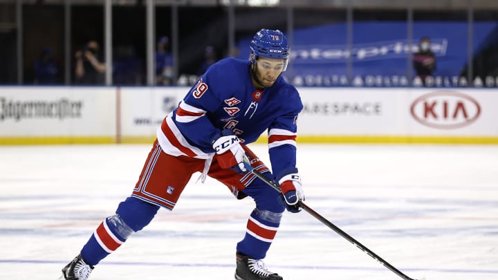 NEW YORK, NEW YORK – APRIL 22: K’Andre Miller #79 of the New York Rangers takes the puck in the second period against the Philadelphia Flyersat Madison Square Garden on April 22, 2021 in New York City. (Photo by Elsa/Getty Images)