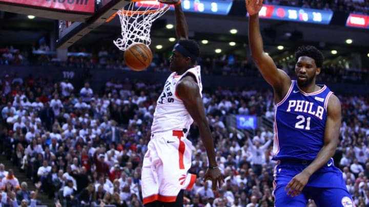 Pascal Siakam #43 of the Toronto Raptors dunks the ball as Joel Embiid #21 of the Philadelphia 76ers defends in the second half during Game Five of the second round of the 2019 NBA Playoffs at Scotiabank Arena. (Photo by Vaughn Ridley/Getty Images)