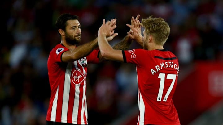 SOUTHAMPTON, ENGLAND - AUGUST 01: Stuart Armstrong of Southampton celebrates with Charlie Austin of Southampton after he scores his sides second goal during the Pre-Season Friendly match between Southampton and Celta Vigo at St Mary's Stadium on August 1, 2018 in Southampton, England. (Photo by Jordan Mansfield/Getty Images)