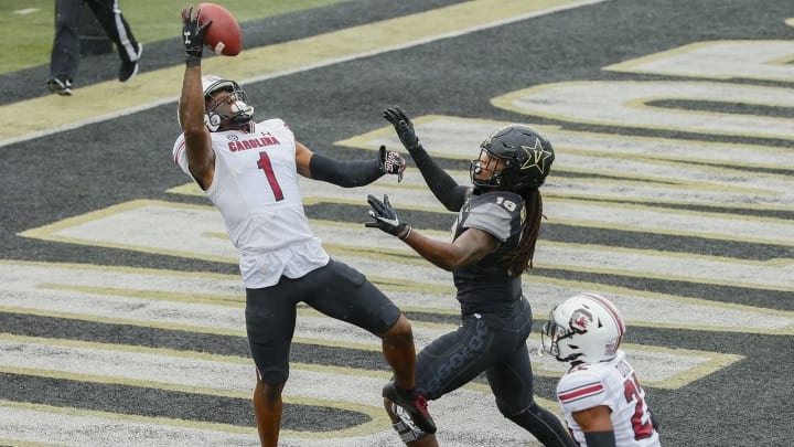 NASHVILLE, TENNESSEE – OCTOBER 10: Jaycee Horn #1 of the South Carolina Gamecocks jumps up for the ball over Chris Pierce #19 of the Vanderbilt Commodores during the first half at Vanderbilt Stadium on October 10, 2020 in Nashville, Tennessee. (Photo by Frederick Breedon/Getty Images)