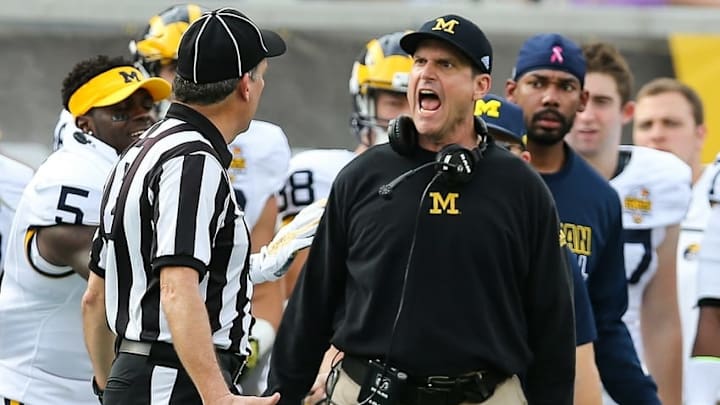 Jan 1, 2016; Orlando, FL, USA; Michigan Wolverines head coach Jim Harbaugh reacts to a call during the second half in the 2016 Citrus Bowl at Orlando Citrus Bowl Stadium. The Wolverines win 41-7 over Florida to claim the Citrus Bowl Championship. Mandatory Credit: Jim Dedmon-USA TODAY Sports