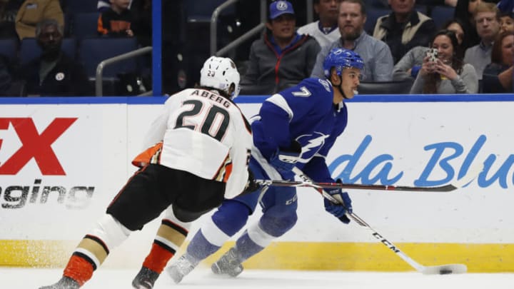 TAMPA, FL - NOVEMBER 27: Tampa Bay Lightning right wing Mathieu Joseph (7) is defended by Anaheim Ducks left wing Pontus Aberg (20) in the second period of the regular season NHL game between the Anaheim Ducks and Tampa Bay Lightning on November 27, 2018 at Amalie Arena in Tampa, FL. (Photo by Mark LoMoglio/Icon Sportswire via Getty Images)