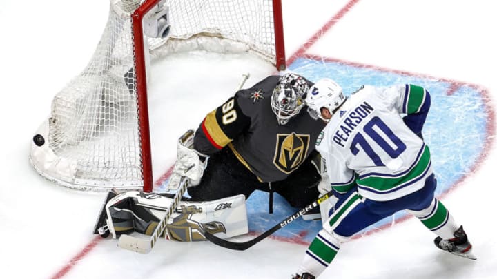 EDMONTON, ALBERTA - SEPTEMBER 04: Robin Lehner #90 of the Vegas Golden Knights stops a shot against Tanner Pearson #70 of the Vancouver Canucks during the third period in Game Seven of the Western Conference Second Round during the 2020 NHL Stanley Cup Playoffs at Rogers Place on September 04, 2020 in Edmonton, Alberta, Canada. (Photo by Bruce Bennett/Getty Images)