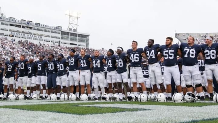 Sep 17, 2016; University Park, PA, USA; Penn State Nittany Lions players sing the alma-mater following the completion of the game against the Temple Owls at Beaver Stadium. Penn State defeated Temple 34-27. Mandatory Credit: Matthew O