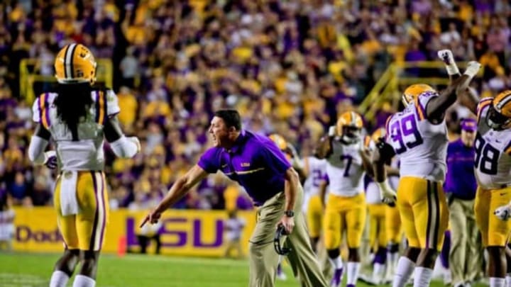 Nov 5, 2016; Baton Rouge, LA, USA; LSU Tigers head coach Ed Orgeron reacts after a defensive stop against the Alabama Crimson Tide during the third quarter of a game at Tiger Stadium. Alabama defeated LSU 10-0. Mandatory Credit: Derick E. Hingle-USA TODAY Sports