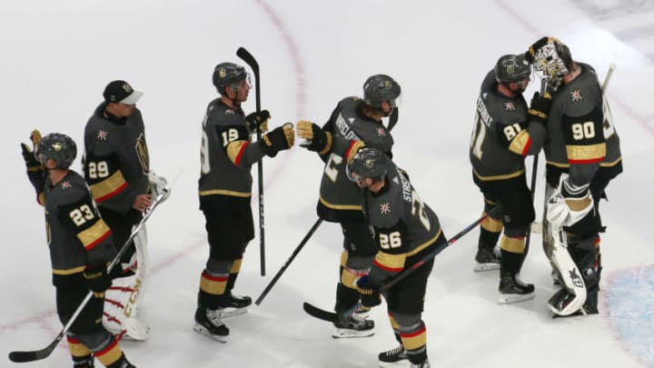 Members of the Vegas Golden Knights celebrate a win against the Chicago Blackhawks in Game One of the Western Conference First Round during the 2020 NHL Stanley Cup Playoffs. (Photo by Jeff Vinnick/Getty Images)