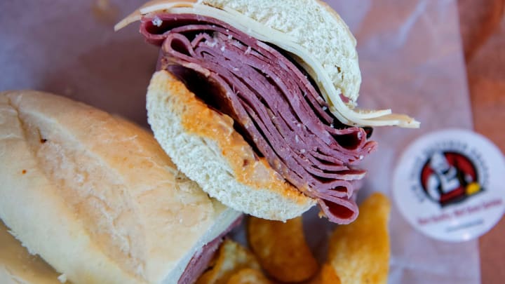 The Verrazano deli sandwich at New York Butcher Shoppe in South Asheville is made with pastrami, corned beef and Swiss cheese.Nybutcher Shoppe 008