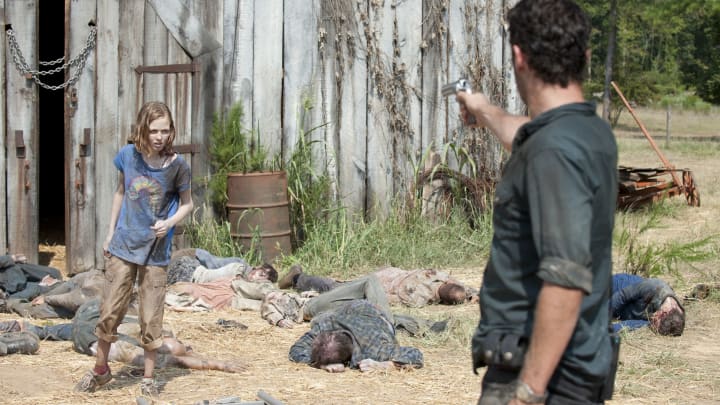 Walker Sophia (Madison Lintz) and Rick Grimes (Andrew Lincoln) – The Walking Dead – Season 2, Episode 7 – Photo Credit: Gene Page/AMC