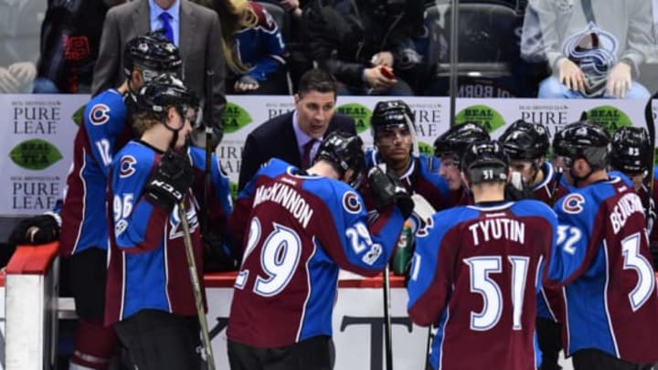 NHL Power Rankings: Colorado Avalanche head coach Jared Bednar huddle with his players in the third period against the Vancouver Canucks at the Pepsi Center. The Canucks defeated the Avalanche 3-2. Mandatory Credit: Ron Chenoy-USA TODAY Sports