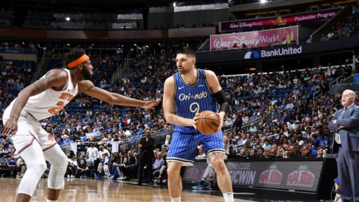 ORLANDO, FL - APRIL 3: Nikola Vucevic #9 of the Orlando Magic handles the ball against the New York Knicks on April 3, 2019 at Amway Center in Orlando, Florida. NOTE TO USER: User expressly acknowledges and agrees that, by downloading and or using this photograph, User is consenting to the terms and conditions of the Getty Images License Agreement. Mandatory Copyright Notice: Copyright 2019 NBAE (Photo by Fernando Medina/NBAE via Getty Images)
