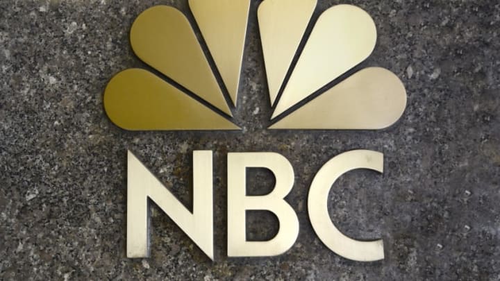 NEW YORK, NY - APRIL 26, 2015: The NBC television network 'peacock' logo' on a granite wall near the entrance to the network's headquarters in Rockefeller Center in Midtown Manhattan in New York, New York. (Photo by Robert Alexander/Getty Images)