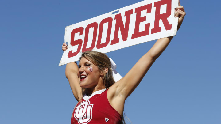 Oct 10, 2015; Dallas, TX, USA; Oklahoma Sooners cheerleader performs during a timeout from the game against the Texas Longhorns during Red River rivalry at Cotton Bowl Stadium. Mandatory Credit: Matthew Emmons-USA TODAY Sports