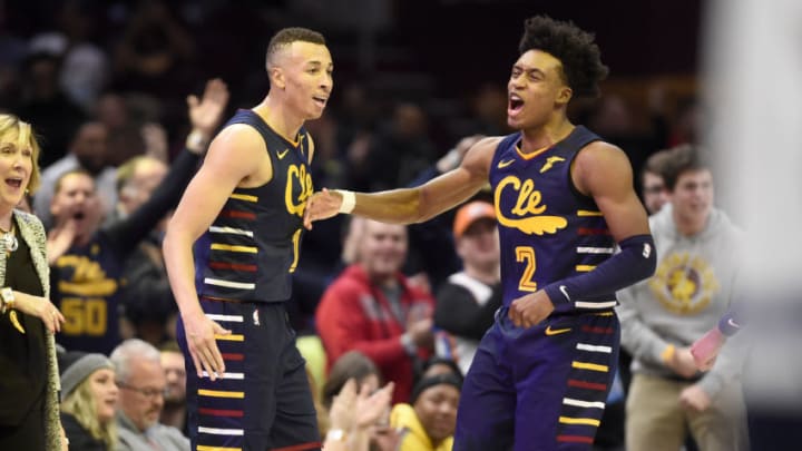 Cleveland Cavaliers guards Dante Exum (left) and Collin Sexton celebrate during a game versus the Minnesota Timberwolves. (Photo by Jason Miller/Getty Images)