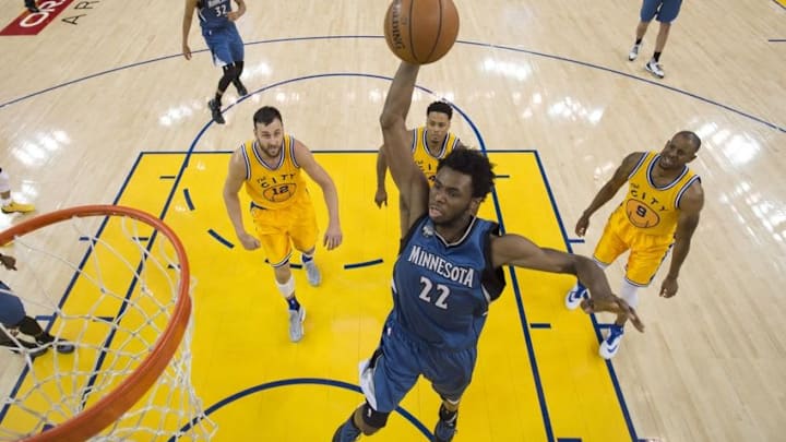 April 5, 2016; Oakland, CA, USA; Minnesota Timberwolves guard Andrew Wiggins (22) dunks the basketball against the Golden State Warriors during the second half at Oracle Arena. The Timberwolves defeated the Warriors 124-117. Mandatory Credit: Kyle Terada-USA TODAY Sports