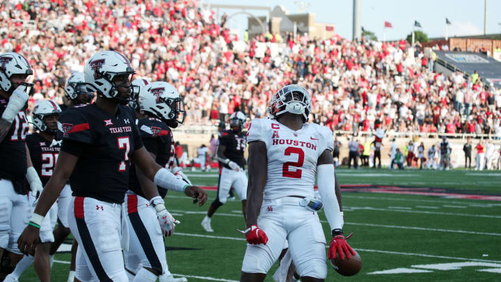 Sep 10, 2022; Lubbock, Texas, USA; Houston Cougars safety Gervarrius Owens (2) reacts after an interception against the Texas Tech Red Raiders in the second half at Jones AT&T Stadium and Cody Campbell Field. Mandatory Credit: Michael C. Johnson-USA TODAY Sports