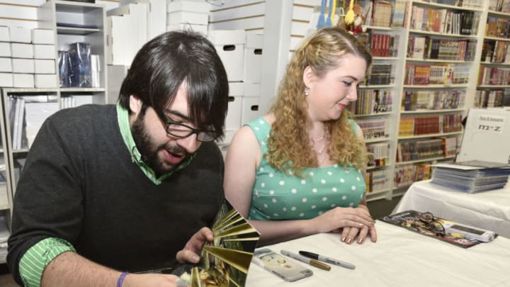 SMITHTOWN, NY - MAY 02: Batman Eternal Writer, James Tynion IV and Earth 2: World's End writer Marguerite Bennett, Signing For DC Comics Free Comic Book Day Special Issue at Fourth World Comics on May 2, 2015 in Smithtown, New York. (Photo by Eugene Gologursky/Getty Images for DC Entertainment)