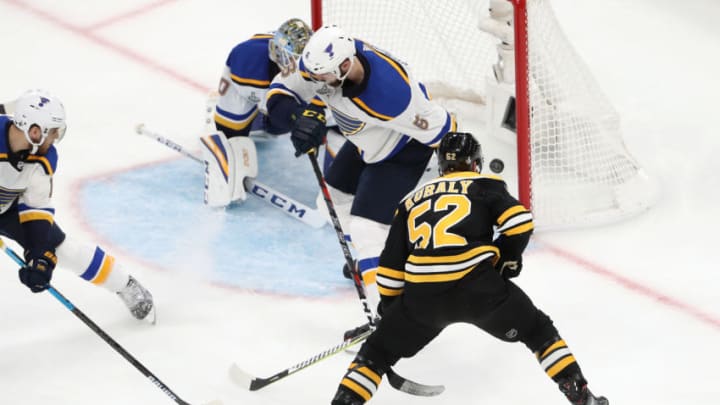 BOSTON, MASSACHUSETTS - MAY 27: Sean Kuraly #52 of the Boston Bruins scores a third period goal past Jordan Binnington #50 of the St. Louis Blues in Game One of the 2019 NHL Stanley Cup Final at TD Garden on May 27, 2019 in Boston, Massachusetts. (Photo by Patrick Smith/Getty Images)