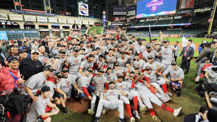 HOUSTON, TEXAS – OCTOBER 30: The Washington Nationals pose for a team photo as they celebrate after defeating the Houston Astros in Game Seven to win the 2019 World Series at Minute Maid Park on October 30, 2019 in Houston, Texas. The Washington Nationals defeated the Houston Astros with a score of 6 to 2. (Photo by Mike Ehrmann/Getty Images)