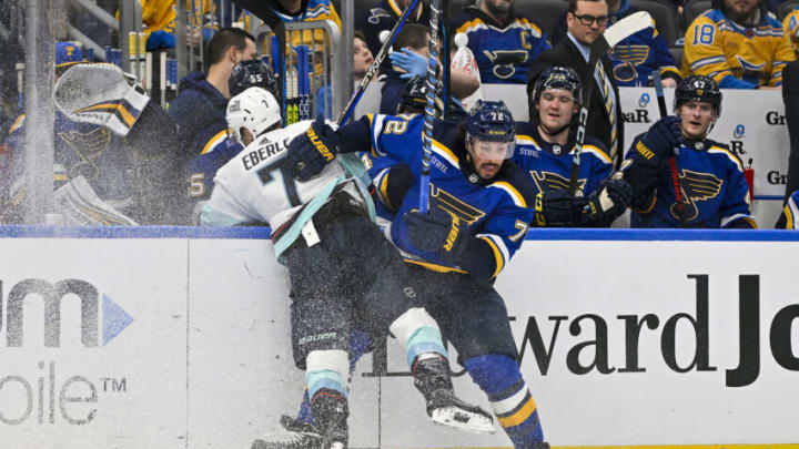 Feb 28, 2023; St. Louis, Missouri, USA; St. Louis Blues defenseman Justin Faulk (72) checks Seattle Kraken right wing Jordan Eberle (7) during the third period at Enterprise Center. Mandatory Credit: Jeff Curry-USA TODAY Sports