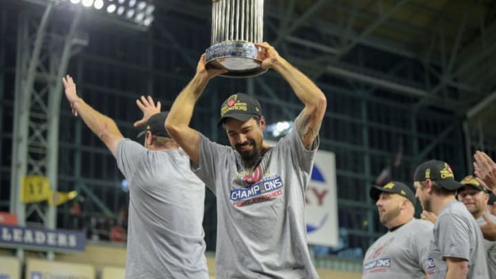 HOUSTON, TEXAS - OCTOBER 30: The Washington Nationals, including Washington Nationals third baseman Anthony Rendon (6) holding trophy, celebrate beating the Houston Astros 6-2 in Game 7 of the World Series at Minute Maid Park on Wednesday, October 30, 2019. (Photo by John McDonnell/The Washington Post via Getty Images)