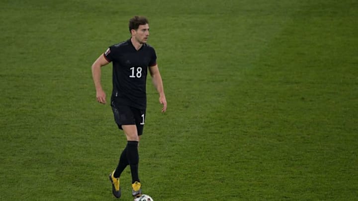 Germany's midfielder Leon Goretzka runs with the ball during the FIFA World Cup Qatar 2022 qualification football match Germany v Iceland in Duisburg, western Germany on March 25, 2021. (Photo by Tobias SCHWARZ / various sources / AFP) (Photo by TOBIAS SCHWARZ/POOL/AFP via Getty Images)