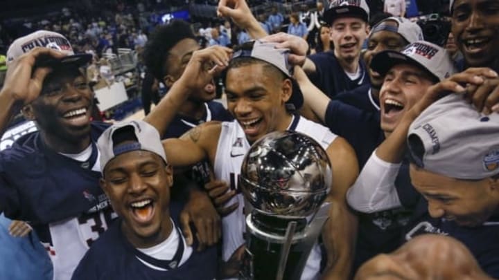 Mar 13, 2016; Orlando, FL, USA; The Connecticut Huskies celebrate after winning the AAC Conference tournament over the Memphis Tigers 72-58 at Amway Center. Mandatory Credit: Reinhold Matay-USA TODAY Sports