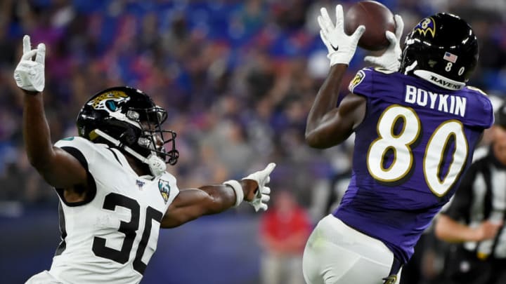 BALTIMORE, MD - AUGUST 08: Miles Boykin #80 of the Baltimore Ravens makes a catch in front of Tae Hayes #30 of the Jacksonville Jaguars during the first half of a preseason game at M&T Bank Stadium on August 8, 2019 in Baltimore, Maryland. (Photo by Will Newton/Getty Images)