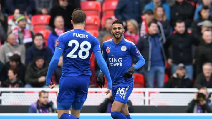 STOKE ON TRENT, ENGLAND - NOVEMBER 04: Riyad Mahrez of Leicester City celebrates with Christian Fuchs of Leicester City after scoring his sides second goal during the Premier League match between Stoke City and Leicester City at Bet365 Stadium on November 4, 2017 in Stoke on Trent, England. (Photo by Michael Regan/Getty Images)