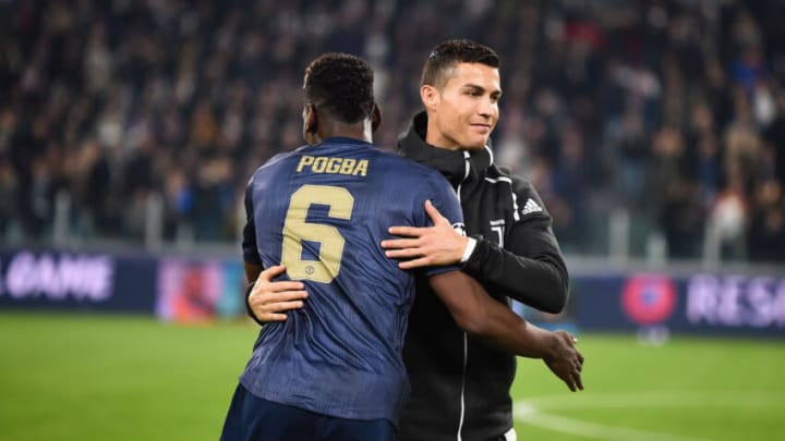 TURIN, ITALY - NOVEMBER 07: Paul Pogba of Manchester United hugs Cristiano Ronaldo of Juventus FC during the Group H match of the UEFA Champions League between Juventus and Manchester United at on November 7, 2018 in Turin, Italy. (Photo by Lukasz Laskowski/PressFocus/MB Media/Getty Images)