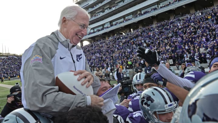 MANHATTAN, KS - NOVEMBER 26: Head coach Bill Snyder (C) of the Kansas State Wildcats gets carried off the field, after winning his 200th career game against the Kansas Jayhawks on November 26, 2016 at Bill Snyder Family Stadium in Manhattan, Kansas. (Photo by Peter G. Aiken/Getty Images)