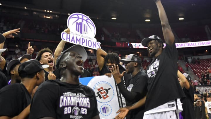 LAS VEGAS, NEVADA - MARCH 11: The San Diego State Aztecs celebrate after defeating the Utah State Aggies 62-57, in the championship game in the Mountain West Conference basketball tournament at the Thomas & Mack Center on March 11, 2023 in Las Vegas, Nevada. (Photo by David Becker/Getty Images)