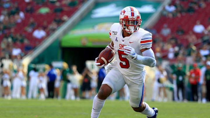 TAMPA, FLORIDA - SEPTEMBER 28: Xavier Jones #5 of the Southern Methodist Mustangs rushes during a game against the South Florida Bullsat Raymond James Stadium on September 28, 2019 in Tampa, Florida. (Photo by Mike Ehrmann/Getty Images)