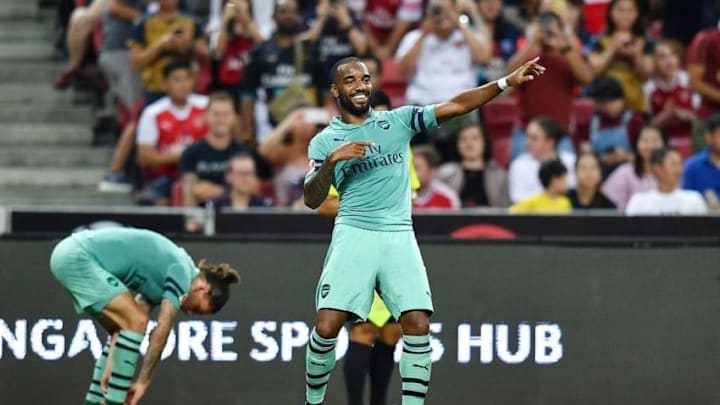 SINGAPORE - JULY 28: Alexandre Lacazette #9 of Arsenal celebrates during the International Champions Cup match between Arsenal and Paris Saint Germain at the National Stadium on July 28, 2018 in Singapore. (Photo by Thananuwat Srirasant/Getty Images for ICC)