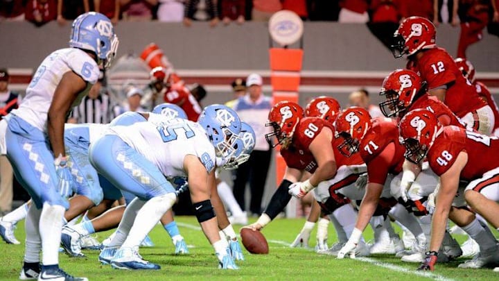 Nov 28, 2015; Raleigh, NC, USA; A general view of the line of scrimmage during the second half between the North Carolina Tar Heels and North Carolina State Wolfpack at Carter Finley Stadium. North Carolina won 45-34. Mandatory Credit: Rob Kinnan-USA TODAY Sports
