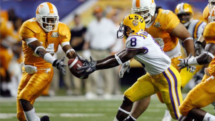 ATLANTA – DECEMBER 01: Trindon Holliday #8 of the Louisiana State University Tigers fights for a fumble with Eric Berry #14 of the University of Tennessee Volunteers in the SEC Championship game on December 1, 2007, at the Georgia Dome in Atlanta, Georgia. The Tigers defeated the Volunteers 21-14. (Photo by Chris Graythen/Getty Images)