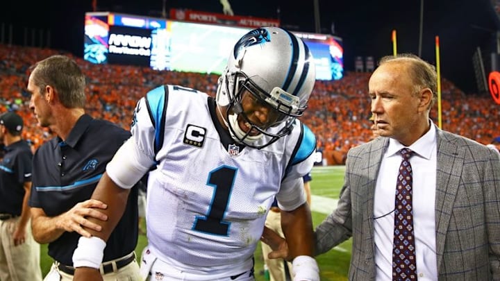 Sep 8, 2016; Denver, CO, USA; Carolina Panthers quarterback Cam Newton (1) reacts in pain on the sidelines after suffering an injury in the third quarter against the Denver Broncos at Sports Authority Field at Mile High. Mandatory Credit: Mark J. Rebilas-USA TODAY Sports