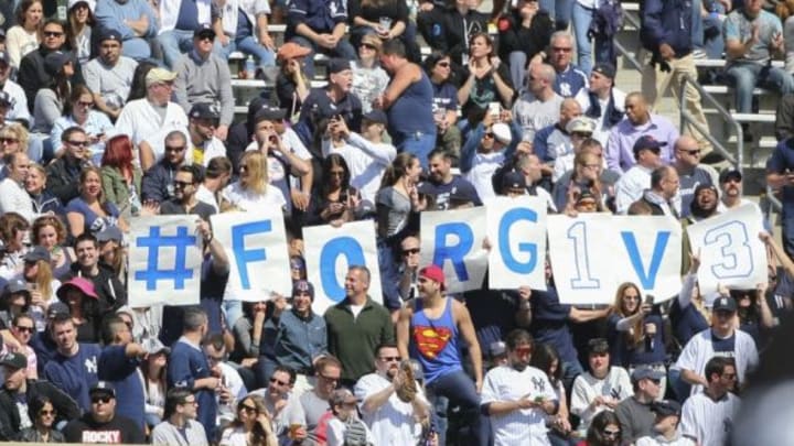 Apr 6, 2015; Bronx, NY, USA; Fans display signs during the game between the New York Yankees and the Toronto Blue Jays on Opening Day at Yankee Stadium. Mandatory Credit: Anthony Gruppuso-USA TODAY Sports