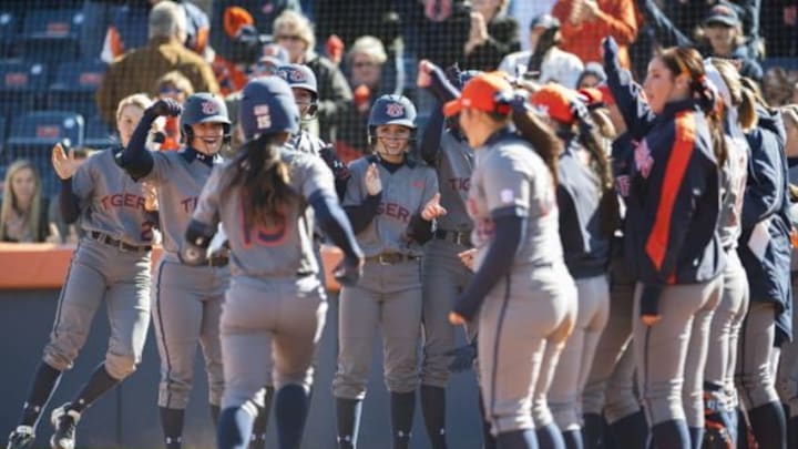 Bree Fornis (15) is greeted by teammates after a grand slam.Butler vs Auburn in Auburn, Ala. on Saturday, Feb. 13, 2016.Dakota Sumpter/Auburn Athletics