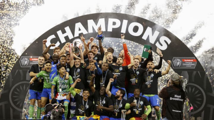 The Seattle Sounders celebrate after beating Liga MX team UNAM to win the ConcaChampions title (Photo by Steph Chambers/Getty Images)