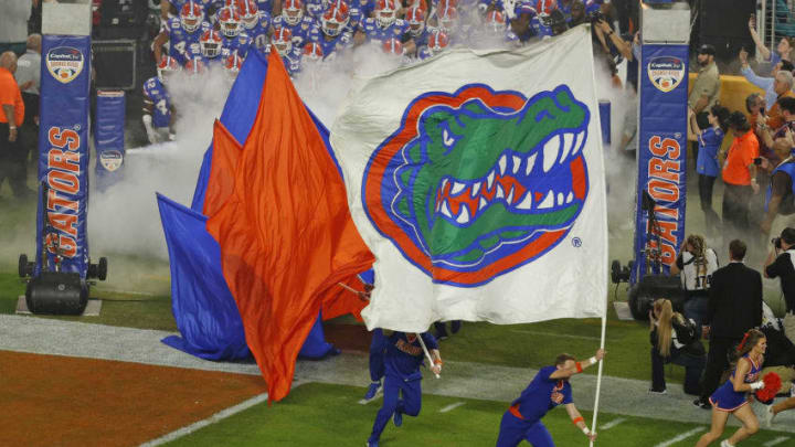 MIAMI GARDENS, FL - DECEMBER 30: The Florida Gators enter the field for the game against the Virginia Cavaliers at the Capital One Orange Bowl at Hard Rock Stadium on December 30, 2019 in Miami Gardens, Florida. Florida defeated Virginia 36-28. (Photo by Joel Auerbach/Getty Images)